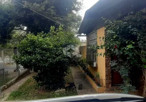 Foto 1 de Casa com 4 Quartos à venda, 165m² em Jardim Leopoldina, Porto Alegre