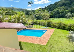 Foto 1 de Casa de Condomínio com 4 Quartos à venda, 340m² em Centro, Rio das Flores