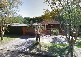 Foto 1 de Casa com 4 Quartos à venda, 205m² em Teresópolis, Porto Alegre