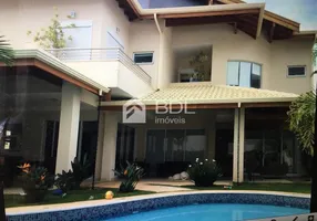 Foto 1 de Casa de Condomínio com 4 Quartos à venda, 427m² em Alphaville Dom Pedro, Campinas