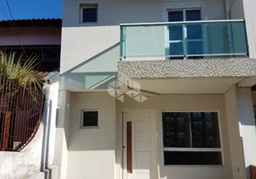 Foto 1 de Casa com 3 Quartos à venda, 100m² em Vila Nova, Porto Alegre