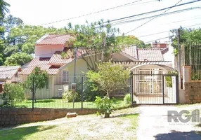 Foto 1 de Casa de Condomínio com 4 Quartos à venda, 200m² em Santa Tereza, Porto Alegre