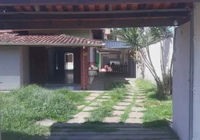 Foto 1 de Casa com 4 Quartos à venda, 360m² em Jardim Britânia, Caraguatatuba