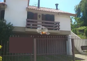 Foto 1 de Casa com 3 Quartos à venda, 251m² em Jardim Lindóia, Porto Alegre