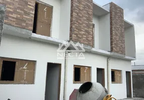 Foto 1 de Sobrado com 2 Quartos à venda, 70m² em Balneário dos Golfinhos , Caraguatatuba