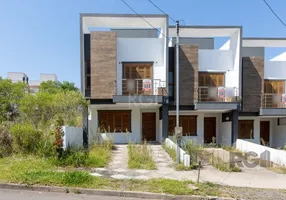 Foto 1 de Casa com 3 Quartos à venda, 181m² em Guarujá, Porto Alegre