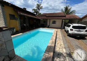 Foto 1 de Casa com 4 Quartos à venda, 134m² em Califórnia, Itanhaém