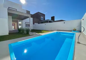 Foto 1 de Casa com 4 Quartos à venda, 205m² em Araca, Capão da Canoa