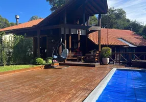 Foto 1 de Casa de Condomínio com 6 Quartos à venda, 363m² em Villagio, Gramado