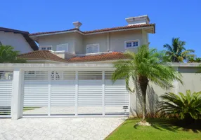 Foto 1 de Casa de Condomínio com 4 Quartos para venda ou aluguel, 542m² em Jardim Acapulco , Guarujá