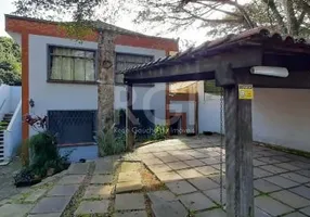 Foto 1 de Casa com 4 Quartos à venda, 300m² em Tristeza, Porto Alegre