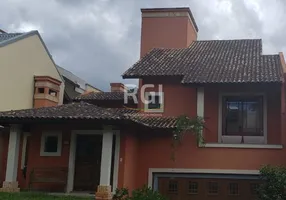 Foto 1 de Casa de Condomínio com 4 Quartos à venda, 236m² em Lomba do Pinheiro, Porto Alegre