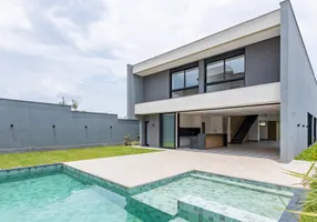 Foto 1 de Casa de Condomínio com 4 Quartos à venda, 426m² em Jardins Italia, Goiânia