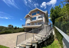 Foto 1 de Casa de Condomínio com 6 Quartos à venda, 900m² em Alto do Capivari, Campos do Jordão