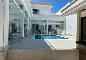 Foto 1 de Casa com 4 Quartos à venda, 309m² em Massaguaçu, Caraguatatuba