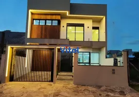 Foto 1 de Casa com 5 Quartos à venda, 215m² em Pitangueiras, Canoas