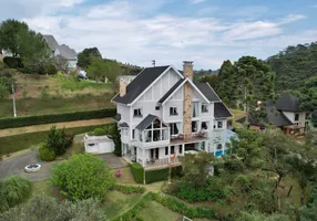 Foto 1 de Casa de Condomínio com 4 Quartos à venda, 400m² em Descansopolis, Campos do Jordão