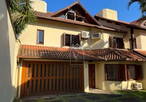 Foto 1 de Casa de Condomínio com 4 Quartos para alugar, 386m² em Petrópolis, Porto Alegre