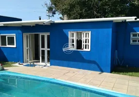 Foto 1 de Casa com 4 Quartos à venda, 158m² em Atlantida Sul, Osório