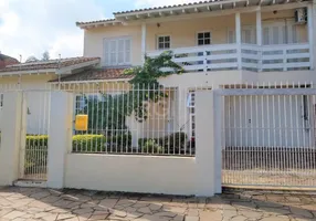 Foto 1 de Casa com 3 Quartos à venda, 265m² em Vila Nova, Porto Alegre