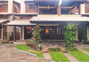 Foto 1 de Casa de Condomínio com 4 Quartos à venda, 161m² em São Francisco, Torres