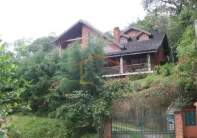 Foto 1 de Casa de Condomínio com 4 Quartos à venda, 568m² em Serra da Cantareira, Mairiporã