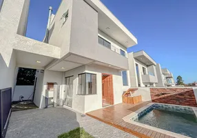 Foto 1 de Casa com 3 Quartos à venda, 130m² em Ibiraquera, Imbituba