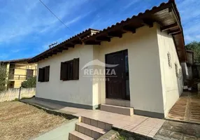 Foto 1 de Casa com 3 Quartos à venda, 103m² em Tarumã, Viamão