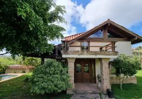 Foto 1 de Casa com 4 Quartos para alugar, 600m² em Vila Nova, Porto Alegre