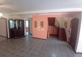 Foto 1 de Sobrado com 3 Quartos à venda, 179m² em Santa Fé, Porto Alegre