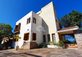 Foto 1 de Casa com 4 Quartos à venda, 400m² em Vila Assunção, Porto Alegre