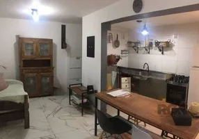 Foto 1 de Apartamento com 1 Quarto para alugar, 72m² em Vila Nova, Porto Alegre
