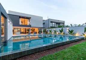 Foto 1 de Casa de Condomínio com 7 Quartos à venda, 580m² em Riviera de São Lourenço, Bertioga