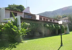 Foto 1 de Casa com 4 Quartos à venda, 673m² em Barra da Tijuca, Rio de Janeiro