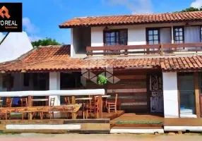 Foto 1 de Casa com 6 Quartos à venda, 250m² em Praia da Ferrugem, Garopaba