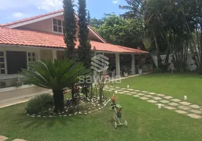 Foto 1 de Casa de Condomínio com 4 Quartos à venda, 540m² em Barra da Tijuca, Rio de Janeiro