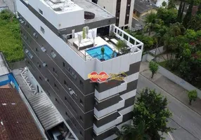 Foto 1 de Apartamento com 4 Quartos à venda, 300m² em Jardim Três Marias, Guarujá