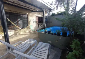 Foto 1 de Casa com 2 Quartos à venda, 81m² em Praia Das Palmeiras, Caraguatatuba