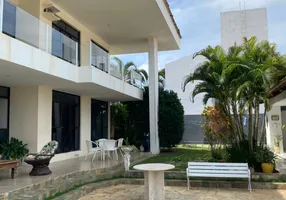 Foto 1 de Casa de Condomínio com 5 Quartos à venda, 500m² em Vilas do Atlantico, Lauro de Freitas