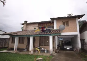 Foto 1 de Casa com 4 Quartos à venda, 258m² em Ressaca, Ubatuba