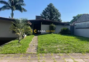 Foto 1 de Casa com 5 Quartos à venda, 498m² em Vila Assunção, Porto Alegre