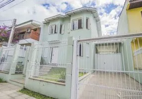 Foto 1 de Sobrado com 4 Quartos à venda, 315m² em Vila Ipiranga, Porto Alegre