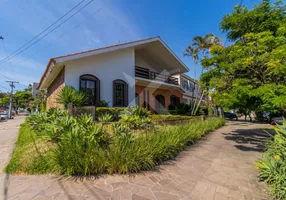 Foto 1 de Casa com 6 Quartos para venda ou aluguel, 500m² em Chácara das Pedras, Porto Alegre