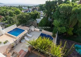 Foto 1 de Casa com 4 Quartos à venda, 474m² em Jardim Isabel, Porto Alegre