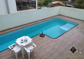 Foto 1 de Casa de Condomínio com 4 Quartos à venda, 245m² em Ariribá, Balneário Camboriú