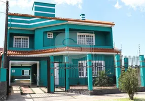 Foto 1 de Sobrado com 3 Quartos à venda, 262m² em Santa Fé, Porto Alegre