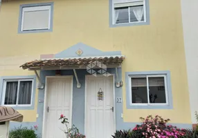 Foto 1 de Casa com 2 Quartos à venda, 53m² em Santo Antonio, Gravataí