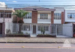 Foto 1 de Sobrado com 6 Quartos à venda, 350m² em Água Verde, Curitiba