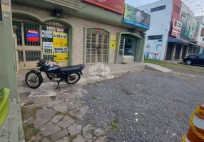 Foto 1 de Casa com 5 Quartos à venda, 327m² em Passo da Areia, Porto Alegre