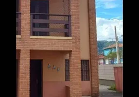 Foto 1 de Sobrado com 2 Quartos à venda, 86m² em Martim de Sa, Caraguatatuba